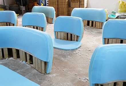 Upholstered chair forms during production