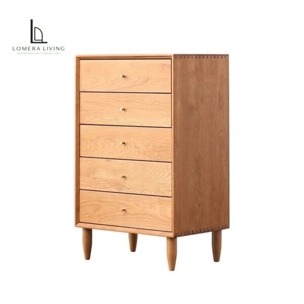 Natural cherry wood five-drawer chest with brass pulls and tapered legs