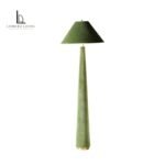 Sculptural tapered green floor lamp with fabric shade