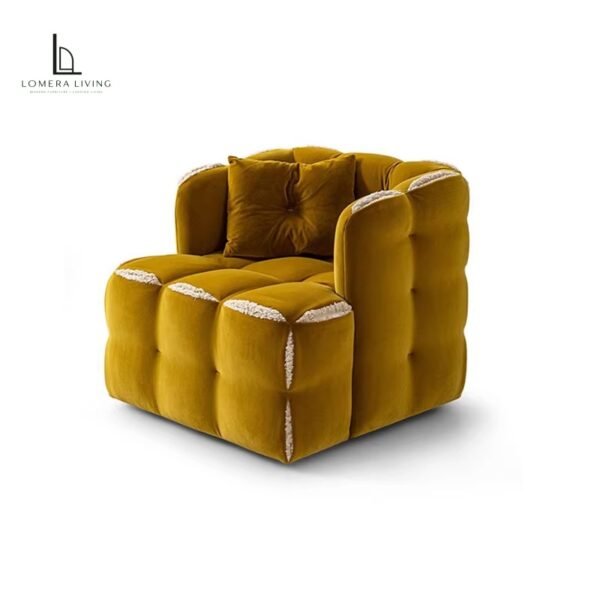 Custom quilted contrast-trim upholstered armchair