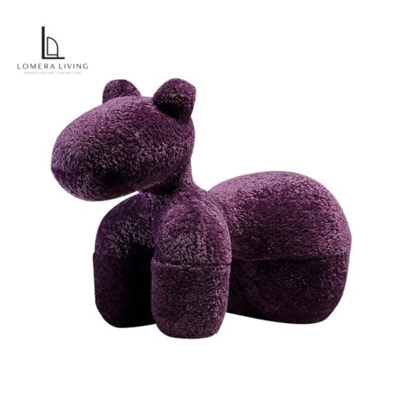 Deep purple sculptural animal lounge chair with textured upholstery