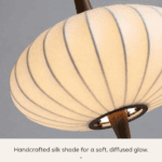 Close-up of the silk shade on a sculptural wooden floor lamp